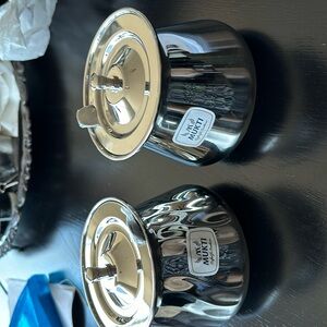 Stainless steel set of two container to keep  liquids or dry